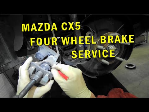 Видео: ОБСЛУЖИВАНИЕ ТОРМОЗОВ НА ЧЕТЫРЕ КОЛЕСА MAZDA CX5