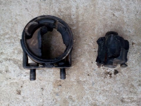 Видео: Замена передней и задней подушки КПП на Mazda Demio