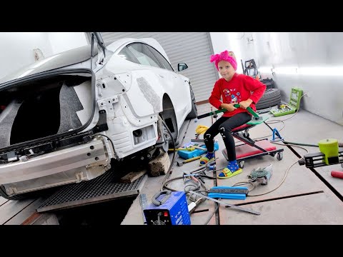 Видео: Tesla Model 3 . Рихтовка заднего крыла.