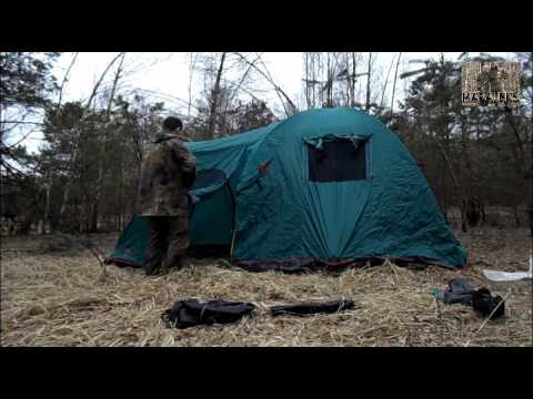 Видео: Обзор и установка палатки Tramp Anaconda