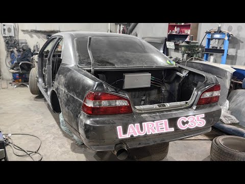 Видео: Установка крыльев из стекло волокна Nissan Laurel c35