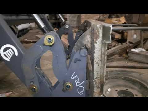 Видео: погрузчик Turs universal 1000кг. обзор. быстросъёмные рабочие органы (вилы, отвал, ковш)