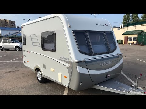 Видео: Обзор прицепа дачи Hymer Nova SL-390.