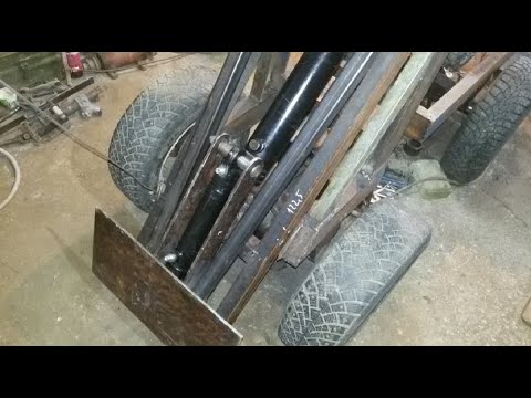 Видео: Мини погрузчик 4х4 стрела копир