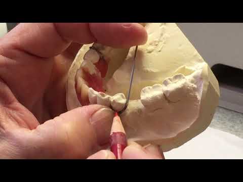 Видео: Проволока, сгибающая застежку