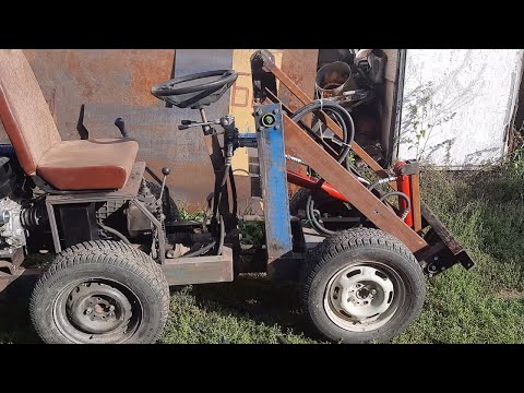 Видео: Погрузчик с самодельным реверсом.