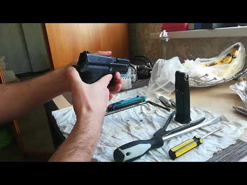 Видео: Краткий обзор на пистолет sig sauer sp2022 с частичной разборкой