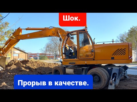 Видео: Экскаватор пневмоколесный Амкадор EW1400A. Обзор.