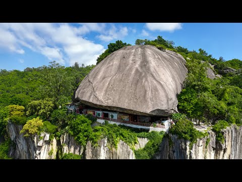 Видео: Безумный Дом на Утесе в Китае: Этот Камень Построен Людьми?