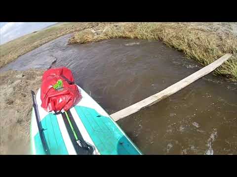 Видео: Сплав от истоков реки Миасс на SUP-борде весной