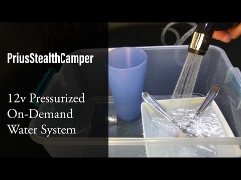Видео: Водопроводная система под давлением 12 В Спрос Prius Stealth Camper Душевая кабина Van Car Мойка