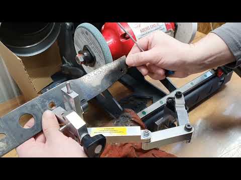 Видео: Заточка ножа газонокосилки.Sharpening a lawn mower blade.