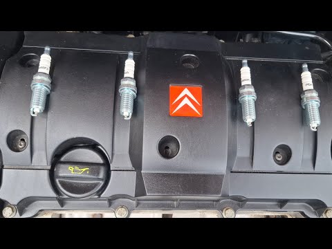 Видео: Обзор свечей зажигания  Ситроен С 4 + установка.