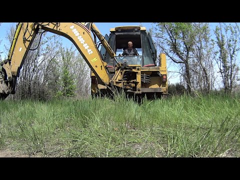 Видео: Как передвигать каретку правильно. Экскаватор-погрузчик.