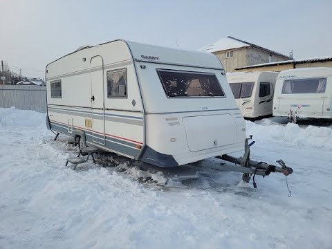 Видео: Обзор зимнего скандинавского прицепа CABBY