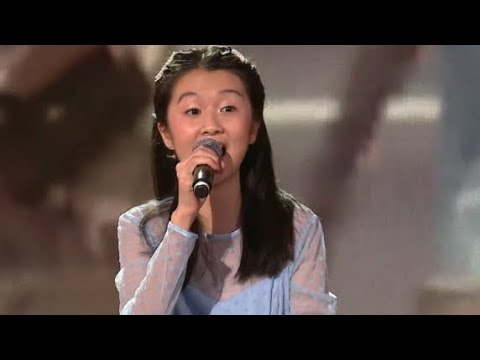 Видео: юная китаянка Сюй Мохань исполняет песню птица счастья.