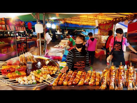 Видео: Бабушка готовит на гриле без остановки! Рыбные шарики, сосиски и тилапия быстро раскупаются