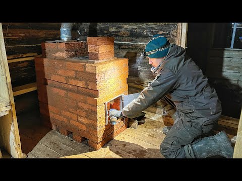 Видео: ДОСТРОИЛИ ПЕЧЬ | ПЕРВАЯ НОЧЬ С НОВОЙ КИРПИЧНОЙ ПЕЧКОЙ В ТАЕЖНОМ ЗИМОВЬЕ