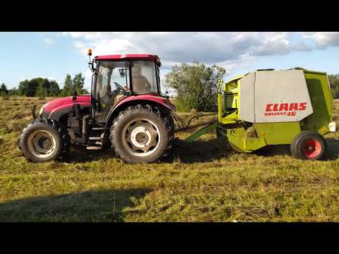 Видео: YTO 904 и Class Rollant 46 прессуют сено.
