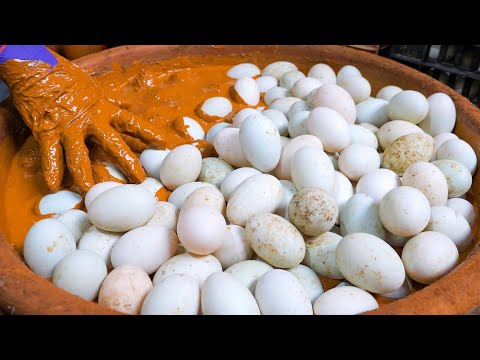 Видео: Как делают соленые утиные яичные желтки - тайваньская традиционная еда