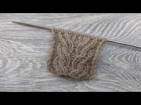 Видео: Объемный узор спицами "рельефная коса" (раппорт - 21 петля, 6 рядов).