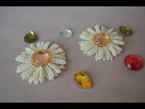 Видео: Цветок из бисера "Ромашка".  Бисероплетение.  Мастер класс