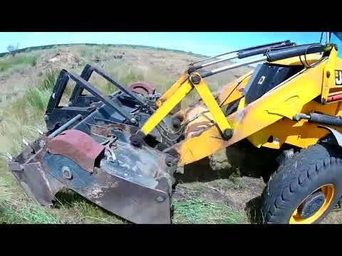 Видео: JCB 3CX. Как управлять челюстью, два рычага.