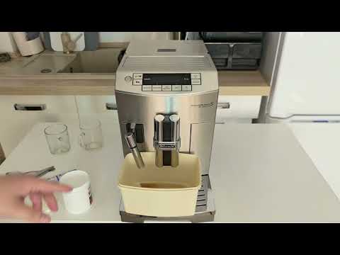 Видео: Чистка от кофейных масел и накипи DeLonghi PrimaDonna S De Luxe