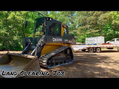 Видео: John Deere 325G Расчистка земли с помощью грейфера