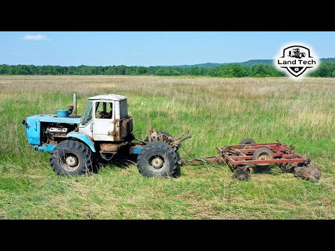 Видео: Первая обработка залежного поля на стареньком советском тракторе Т-150К с дисковой бороной БДТ-3
