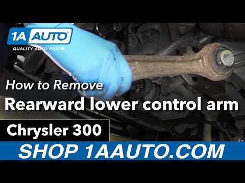 Видео: Как заменить нижние рычаги передней и задней подвески Chrysler 300 05-10