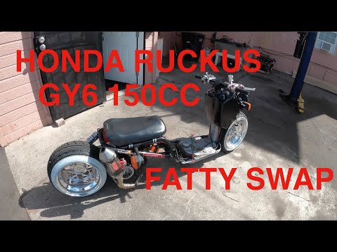 Видео: Как заменить колесо Honda Ruckus Fatty Wheel на 150-кубовом Gy6