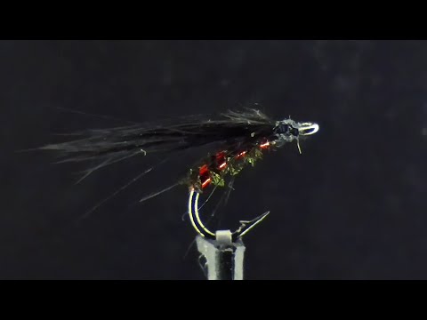 Видео: Верховая муха из бородок пера павлина и петуха