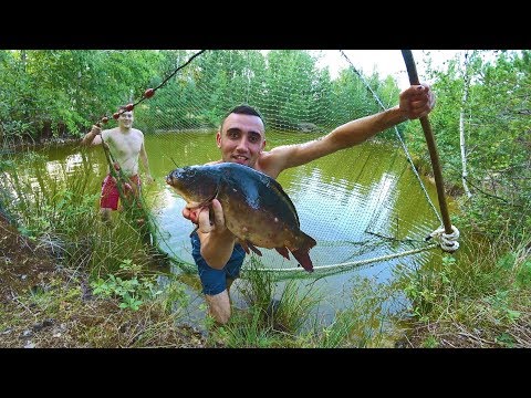 Видео: ЛОВЛЯ НЕВОДОМ НА СЕКРЕТНОМ ОЗЕРЕ В ЛЕСУ ПОЙМАЛИ МОНСТРА