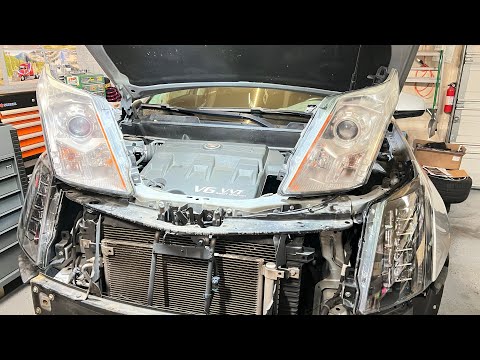 Видео: Кадиллак SRX 2013 . Замена фар , добавляем anti-fog фары . 