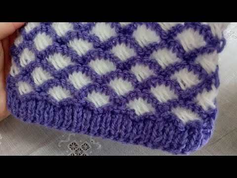Видео: Узоры спицами. Двухцветный узор