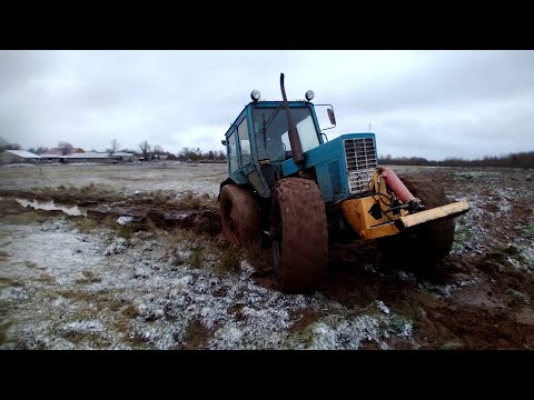 Видео: мтз 80 с мостом газ 66 4х4 по грязи тащит 2 тонны забуксовал