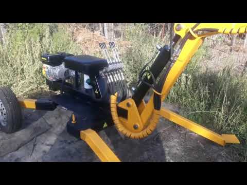 Видео: Прицепной мини экскаватор