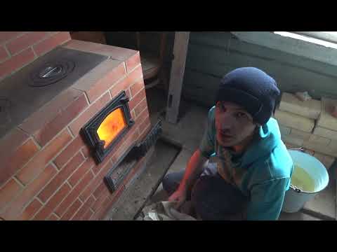 Видео: Кладка отопительно-варочной печи с лежанкой...