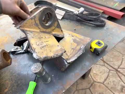 Видео: Ремонт толкающего блока скребка CAT 637G