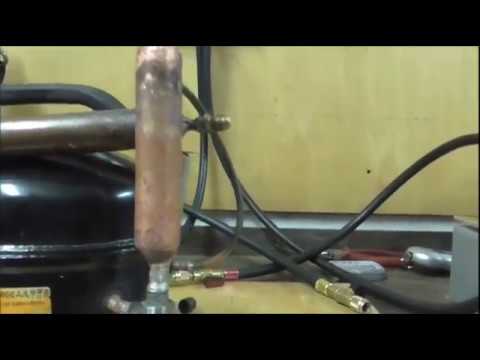 Видео: Компрессор для опрессовки холодильных агрегатов и кондиционеров.