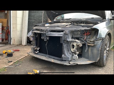 Видео: Замена конденсатора кондиционера Vw Passat B7