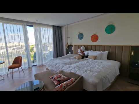 Видео: Номер в отеле Wyndham Дананг