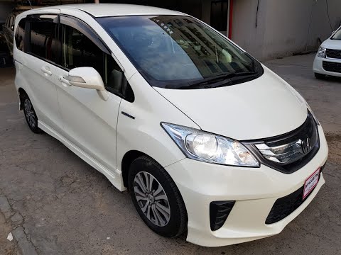 Видео: Honda Freed Гибрид - Лучший компактный минивен!