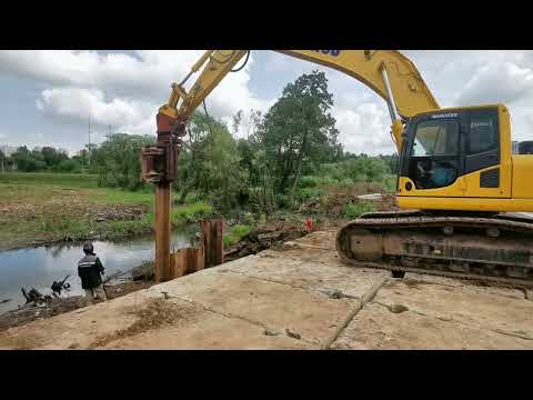 Видео: Погружение шпунта при помощи вибропогружателя.