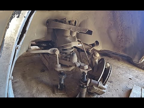 Видео: Замена сайлентблоков нижних рычагов не снимая пружины на газ 31105 "Волга"