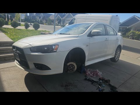 Видео: КАК ЗАМЕНИТЬ ШАРОВОЙ ШАРНИР РЫЧАГА ПОДВЕСКИ MITSUBISHI LANCER