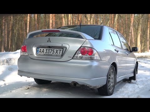 Видео: Mitsubishi Lancer 2.0 RalliArt. Гонка по цене Ланоса.