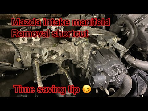 Видео: Быстрый способ снятия впускного коллектора Mazda
