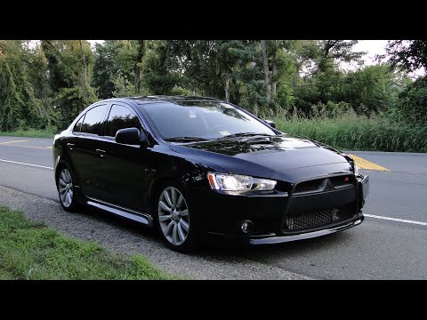 Видео: Mitsubishi Lancer 10 установка Biled aozoom A17